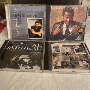 Four Cds. Al Jarreau, Luther Vandross, The Neville Brothers & Aaron Neville